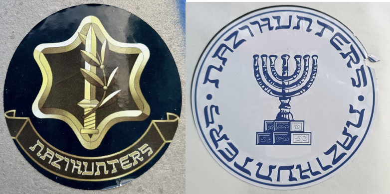 Two circular stickers. On the left, the IDF logo on a black background. On the right, the temple menorah as featured in the Mossad logo printed in blue on a white background. Both stickers feature the Denglish word “Nazihunters” printed in all-caps in a font designed to look like Hebrew.